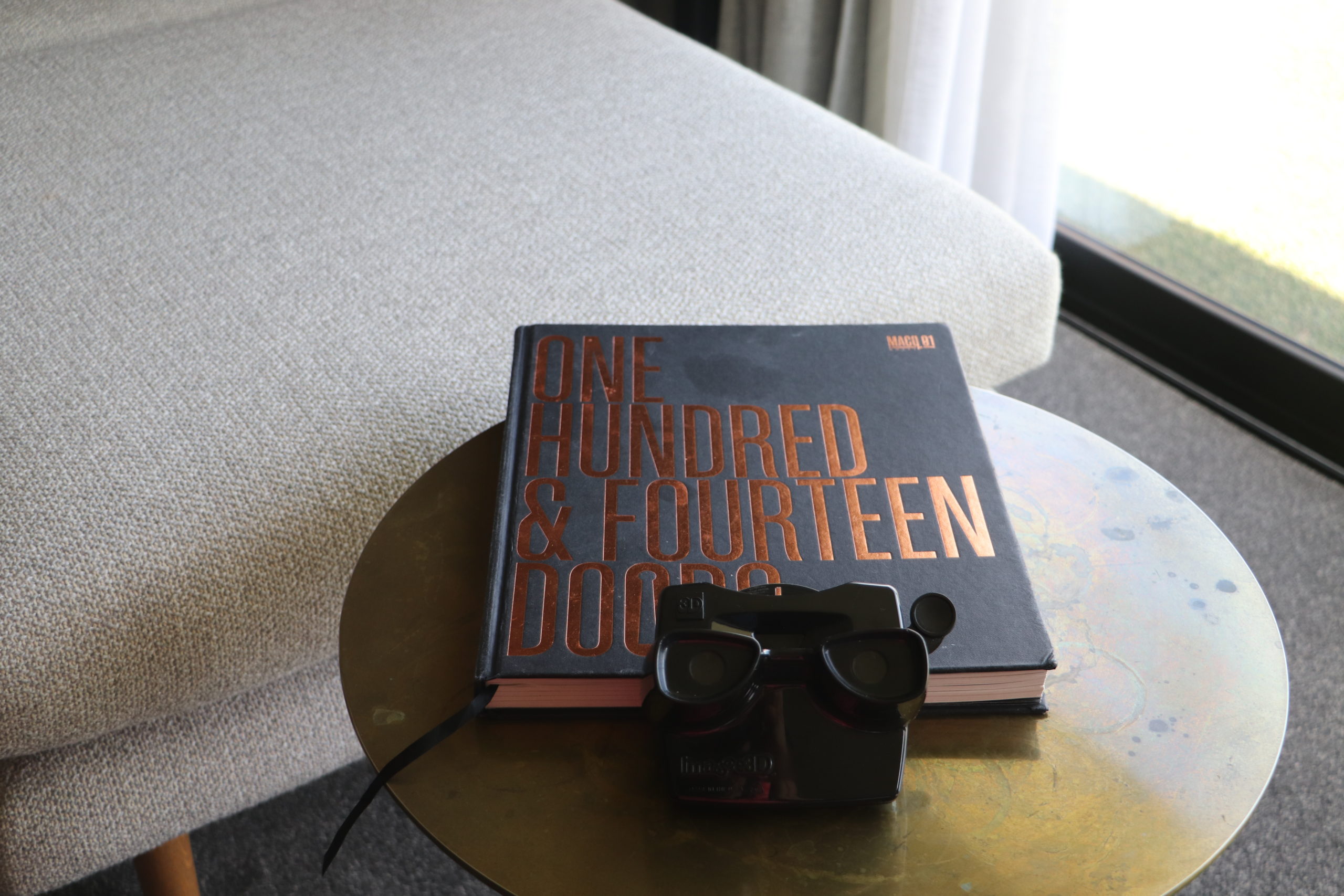 Viewfinder and hotel book inside MACq 01 hotel by Katrina Holden